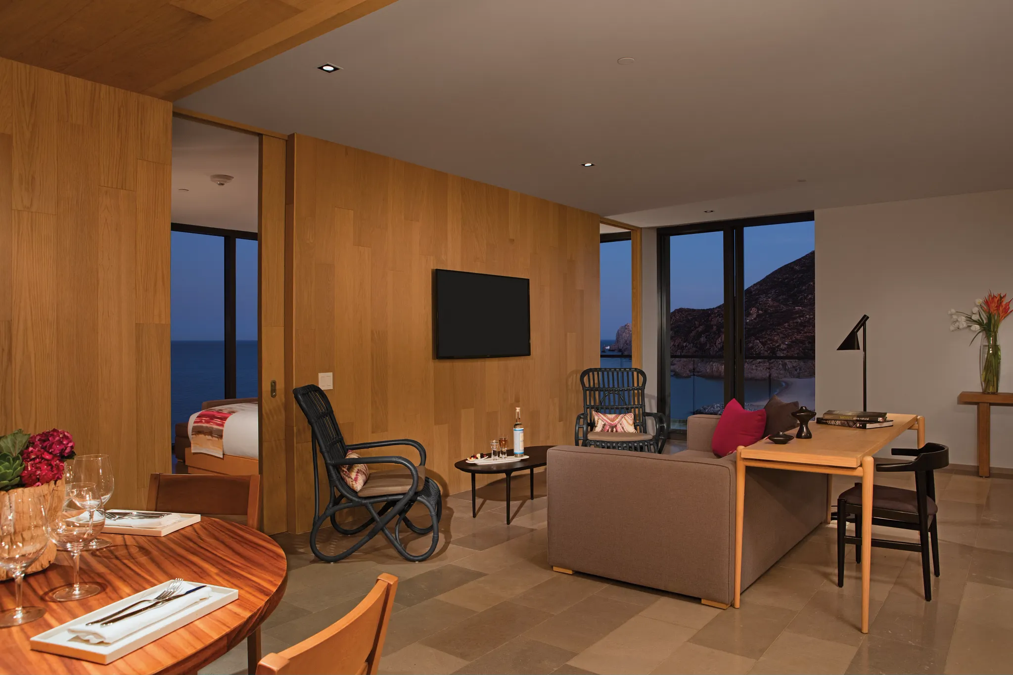 Contemporary living room with ocean views in the Xhale Club Master One Bedroom Suite at Breathless Cabo San Lucas.