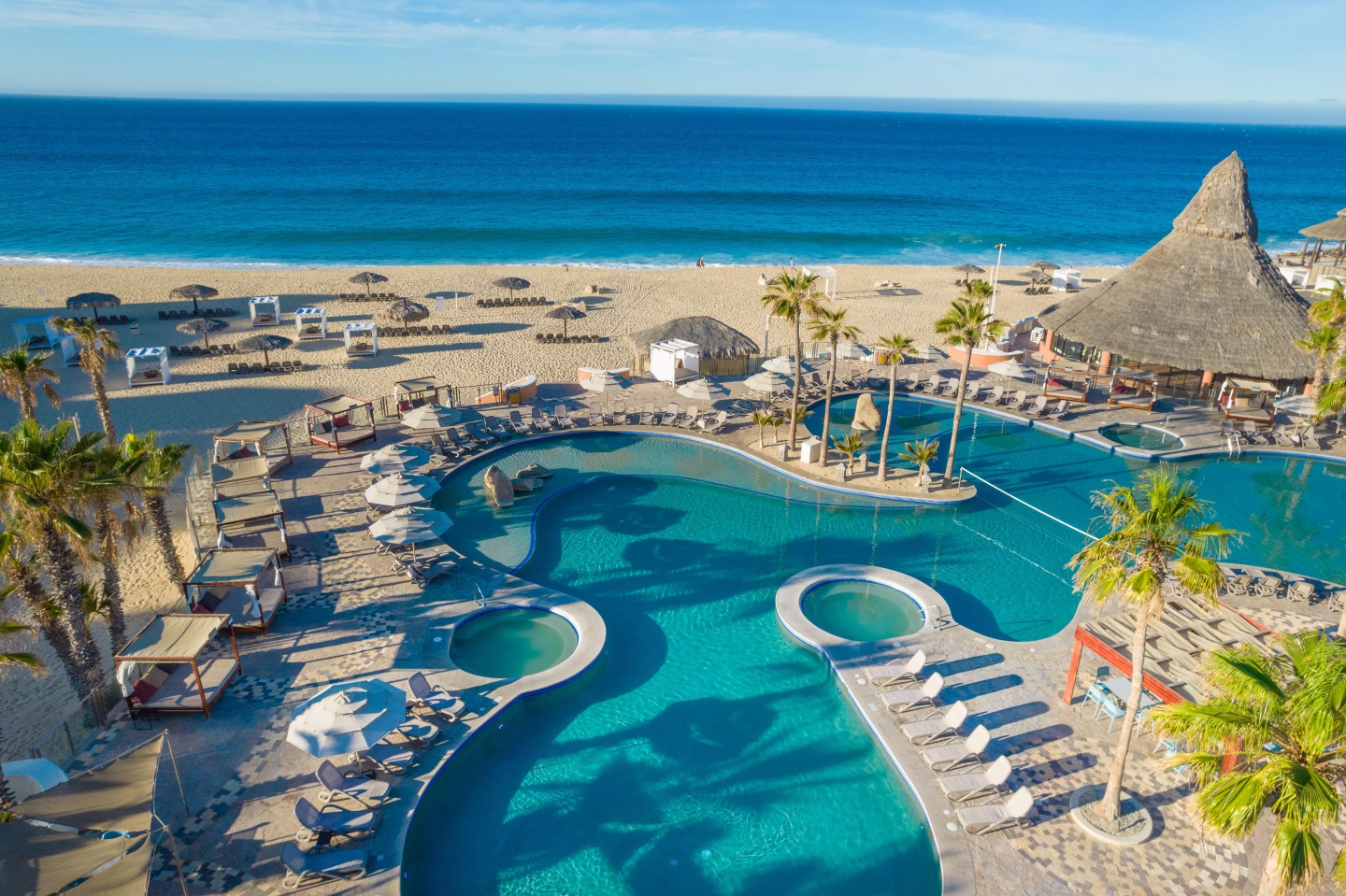 Sandos Finisterra Los Cabos beachfront resort with panoramic Pacific Ocean views and hillside architecture.